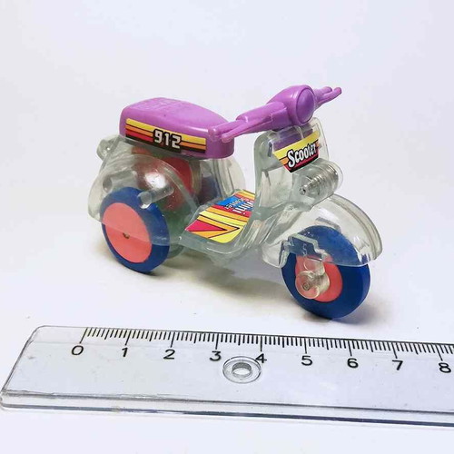 Plastic toy scooter used with scratches