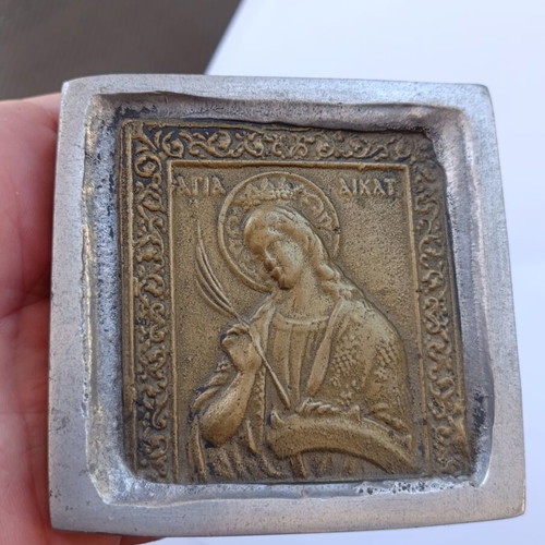 Metal press paperweight icon, vintage