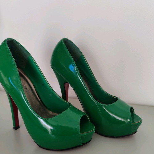 Green patent leather pip toe pumps used