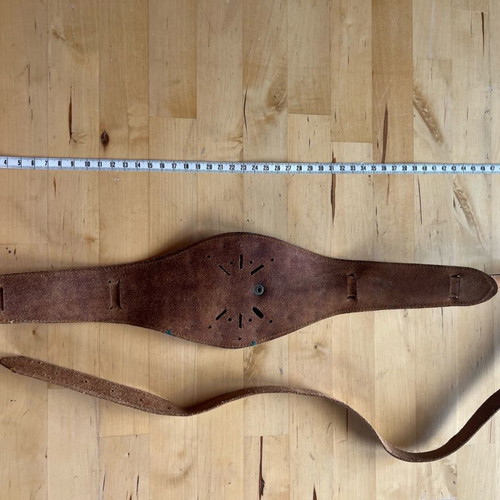 Camel leather belt used with metal details