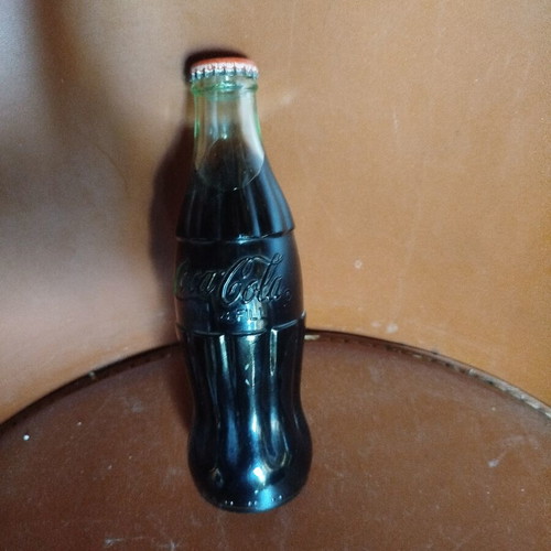 Coca-Cola collectible glass bottle like new from 70s-80s with original cap