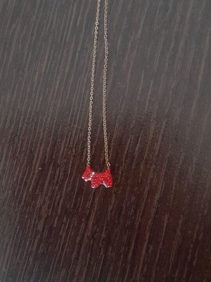 Stainless steel pendant necklace with red rhinestone dog, rose gold chain