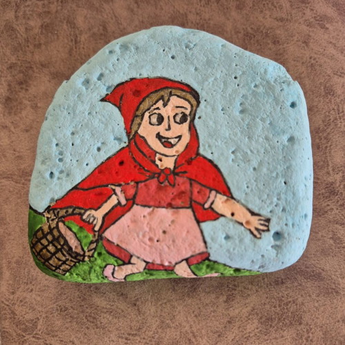 Painted stone with Little Red Riding Hood