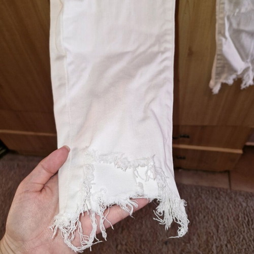 American Eagle white jeans like new, size L with asymmetric hem