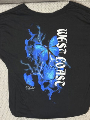 Oversized West Coast T-shirt with blue butterflies and lightning like new