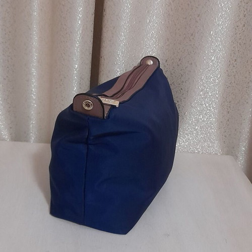 Axel toiletry bag navy blue with brown details