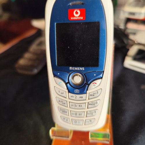 Siemens C65 mobile phone used, some keys not working, no charger