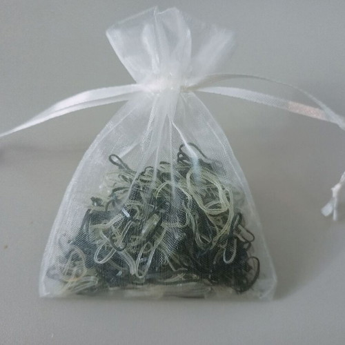 Disposable hair elastics black and transparent like new