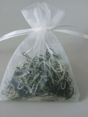 Disposable hair elastics black and transparent like new