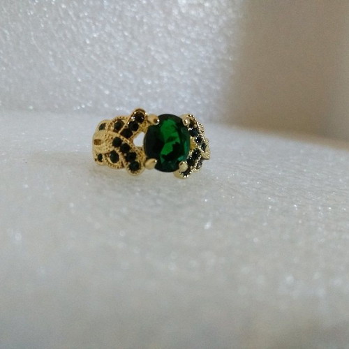 Ring with Oval Green Stone in Gold Color like new