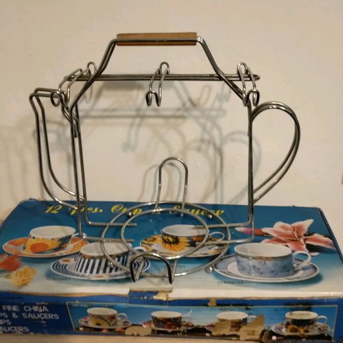 Tea set with metal base unused