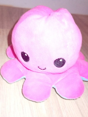 Reversible octopus plush toy used, pink and blue