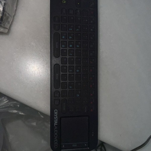 CHRYSTALAUDIOVIDEO remote control with keyboard and touchpad
