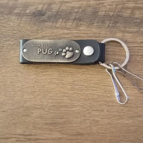 Leather keychain with metal plate for belt attachment