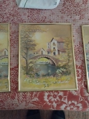 Set of three used gold frames with missing glass in large one