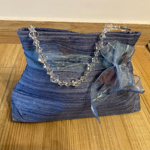 Small blue handbag new with ribbon and transparent beads