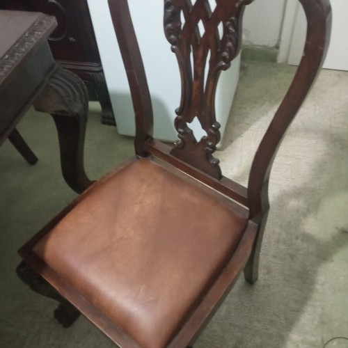 Antique dining table with 6 Lion chairs used, moderate condition
