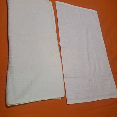 Towel set white 2 pieces new, face embossed and plain body