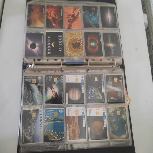 Phone Card Album like new with 100 cards of various themes