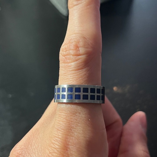 Silver ring with blue squares made of stainless steel