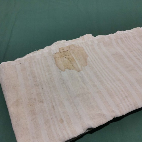 Woven wool bed sheet used with wear from 1930 era