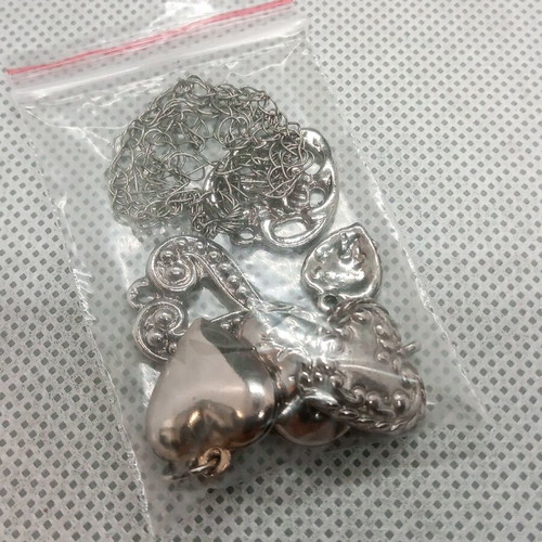 Metal heart-shaped elements like new, pack of seven for crafts