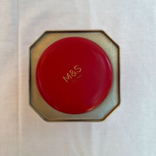 Metal tea tin used from Marks & Spencer
