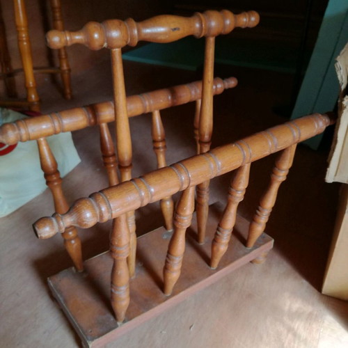 Wooden magazine rack used, carved design