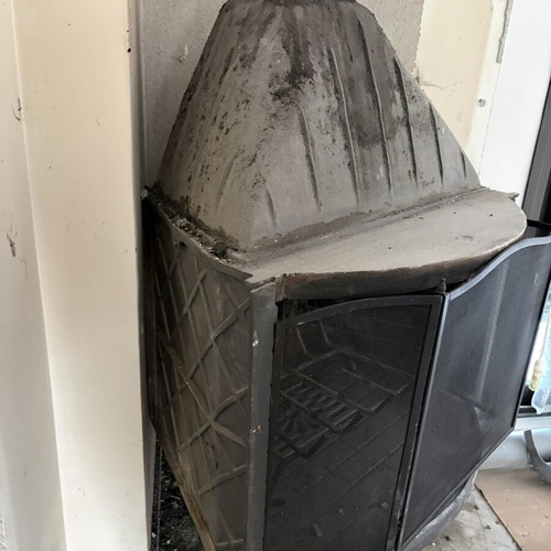 Fireplace with protective metal screen used