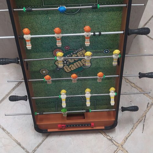 Table football used, missing ball, functional