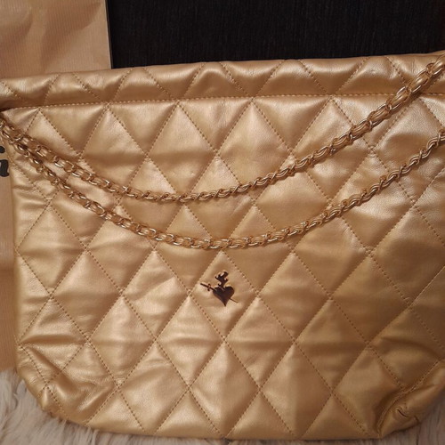 SugarFree quilted gold shoulder bag like new