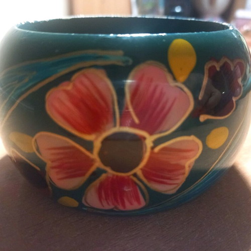 Wooden bracelet used with painted design