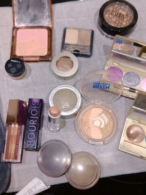 Cosmetics set used with eyeshadows, blushes, lipstick, and lip gloss