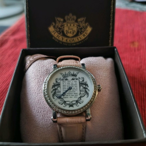 Juicy Couture wristwatch used with Swarovski stones
