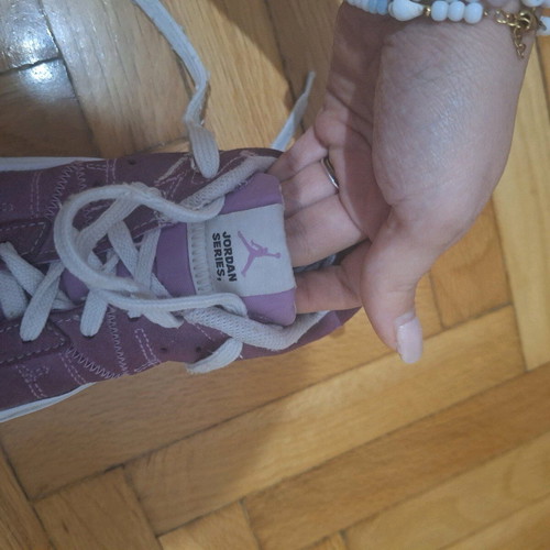 Jordan athletic shoes size 35.5 like new, purple