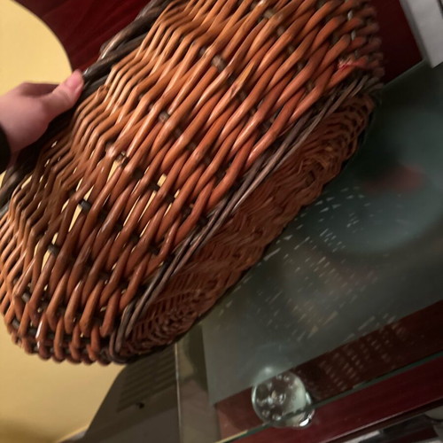 Wicker storage basket used, rustic and practical