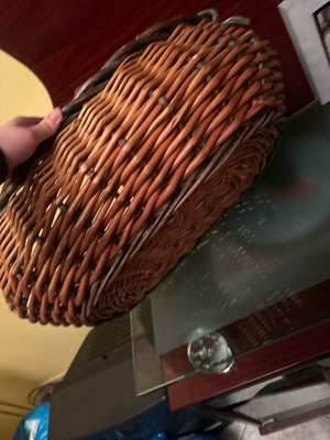 Wicker storage basket used, rustic and practical
