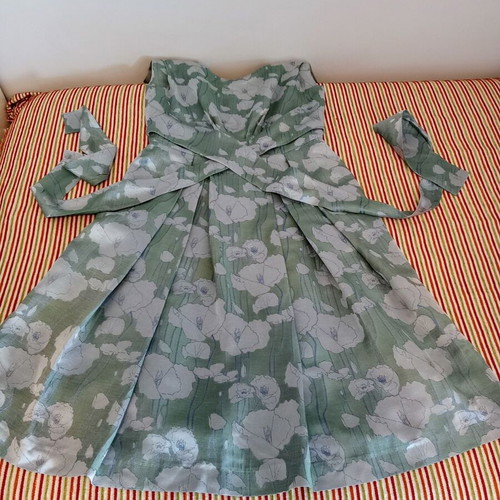 Lola cocktail dress like new, midi green with silver patterns