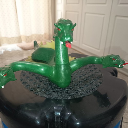Playmobil car and dragon used with many damages