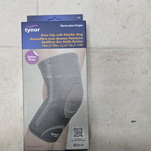 Tynor elastic knee brace like new, with hinges, size large