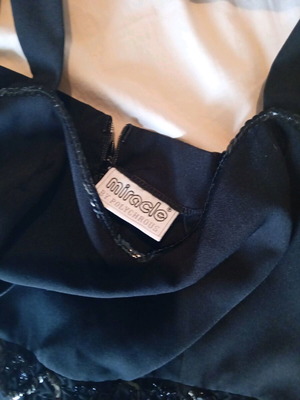 Black mini dress like new with sequins, size M
