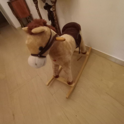 Plush brown rocking horse like new