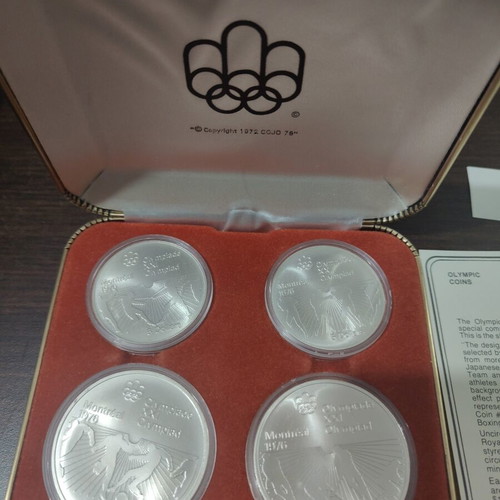 Canadian Silver Olympic Coin Set 1976 like new, 4 coins