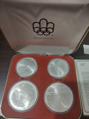 Canadian Silver Olympic Coin Set 1976 like new, 4 coins