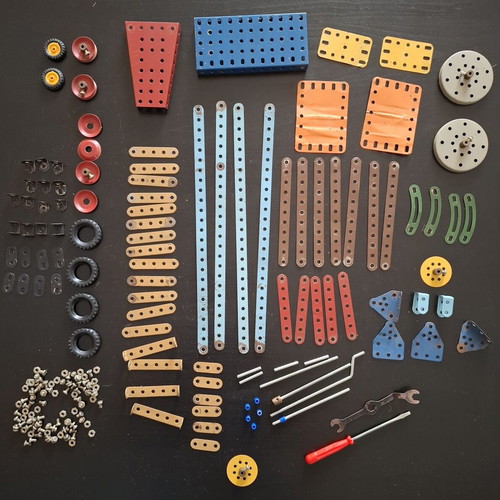 Metal construction toy used with wear