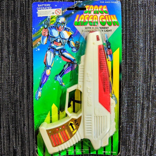 Vintage Space Laser Gun new, sealed in blister pack