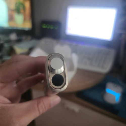 Iqos ILUMA One Gold device used with box and cable