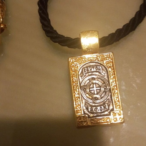 Religious pendant necklace like new, gold and silver