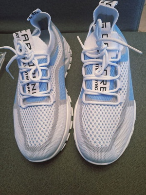 Athletic women's shoes new, white, size 39