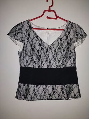 Blouse with sequins in black and white like new, size M